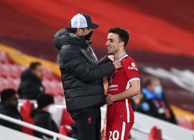 Jurgen Klopp, left, congratulates Diogo Jota after his performance against Leicester