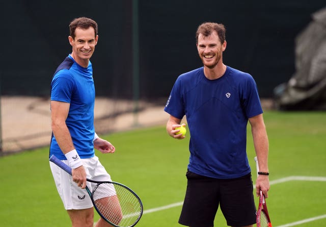 Andy, right, and Jamie Murray smile during practice at Wimbledon