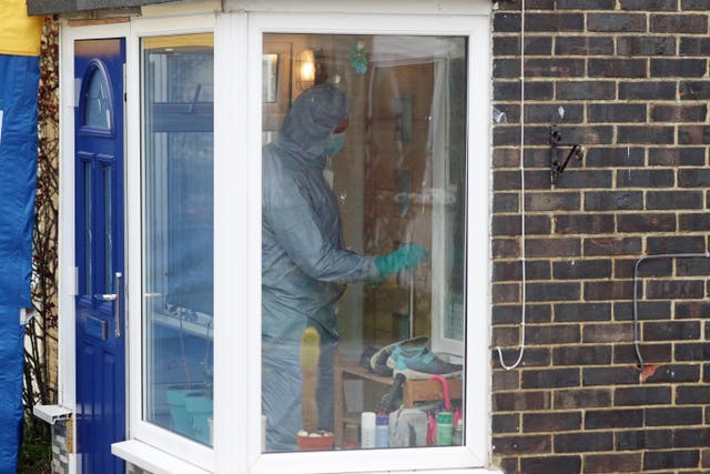 A forensic officer enters the house in Freemens Way in Deal