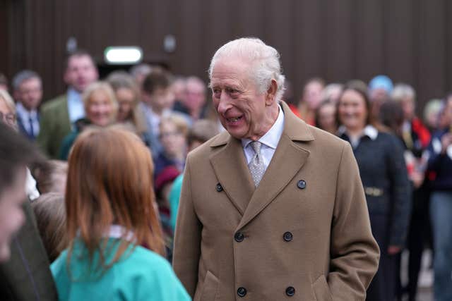 The King meets staff members and their families during his visit to the newly opened Butlers’ cheese campus at Butlers Dairy in Preston on Monday