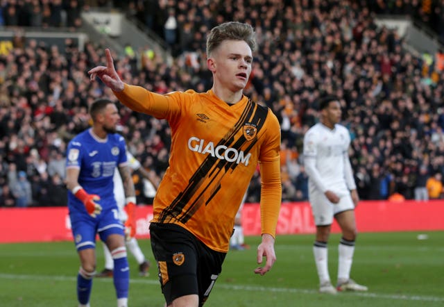 Keane Lewis-Potter celebrates scoring for Hull against Swansea