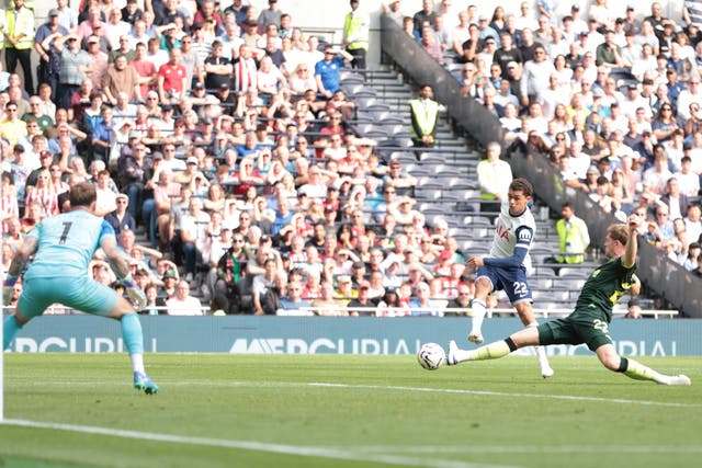 Brennan Johnson (centre) puts Tottenham ahead