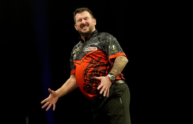 Jonny Clayton reacts during a match on night seven of the Premier League in Dublin