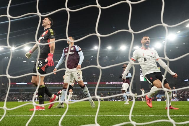 Mohamed Salah celebrates after firing into the net