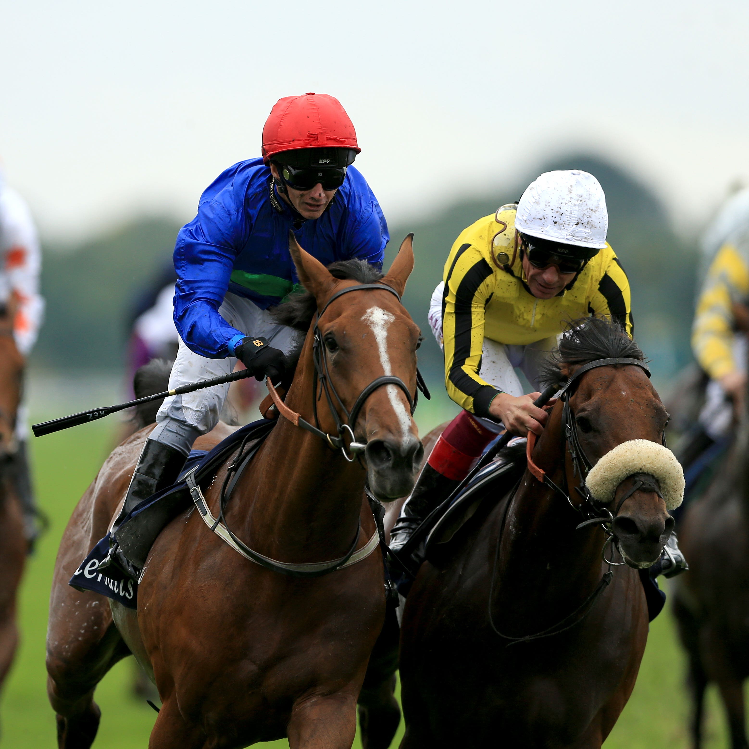 Wells Farhh Go (red cap) on his way to winning the Acomb Stakes at York