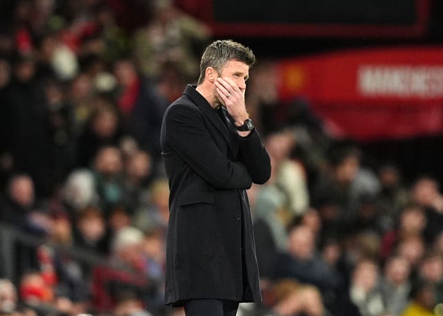 Manchester United manager Michael Carrick looks disappointed on the touchline