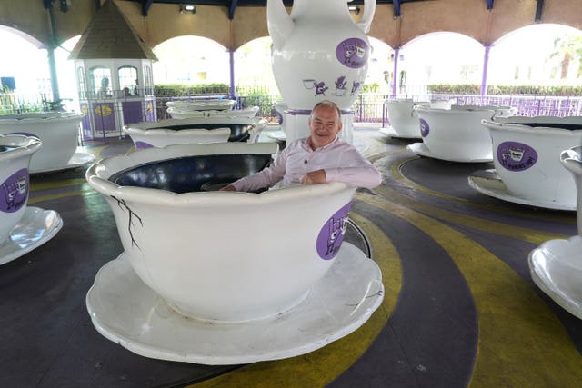 Sir Ed gives the teacup ride a whirl at Thorpe Park