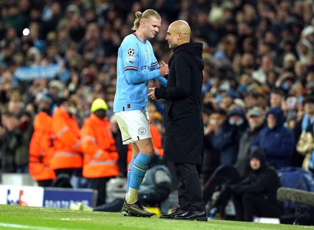 Pep Guardiola, right, will check on Erling Haaland 