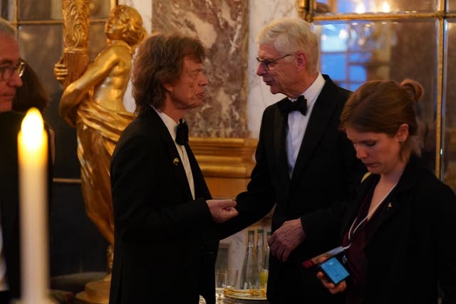 Sir Mick Jagger and Arsene Wenger attending the state banquet