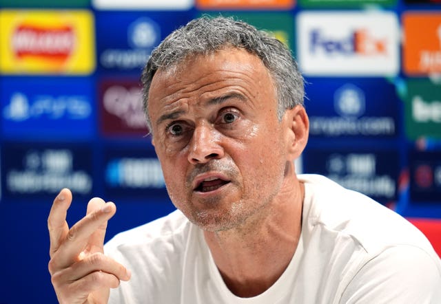 Paris St Germain manager Luis Enrique gestures at a press conference