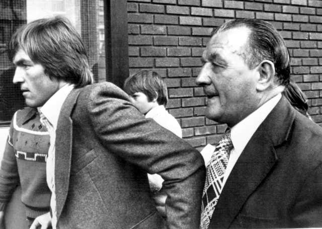 Liverpool manager Bob Paisley, right, greets Kenny Dalglish after   he left Celtic for Anfield in 1977