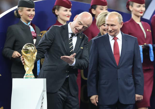 Infantino urged Putin, right, to engage in dialogue to end the war in Ukraine