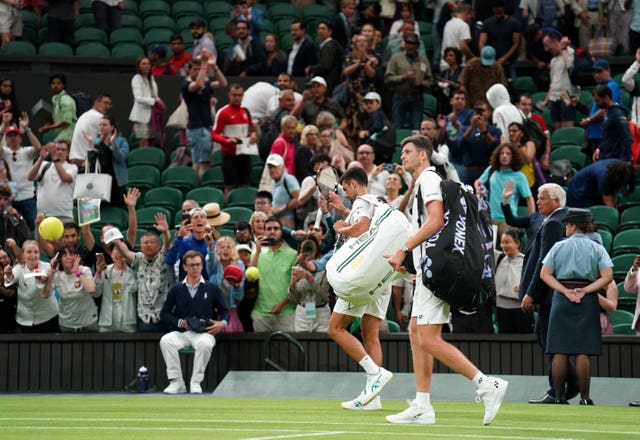 Novak Djokovic and Hubert Hurkacz leave Centre Court after just two sets of their match