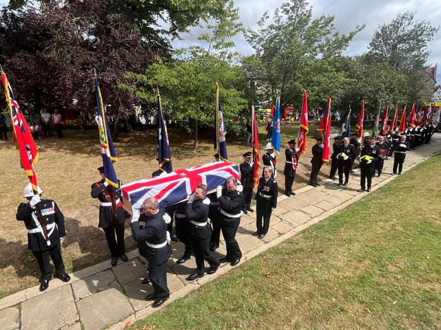 The coffin of Martyn Sadler being carried into St Edburg’s Church in Bicester (Rod Minchin/PA)