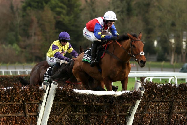 Tahmuras ridden by jockey Harry Cobden on their way to winning the Unibet Tolworth Novices’ Hurdle at Sandown Park