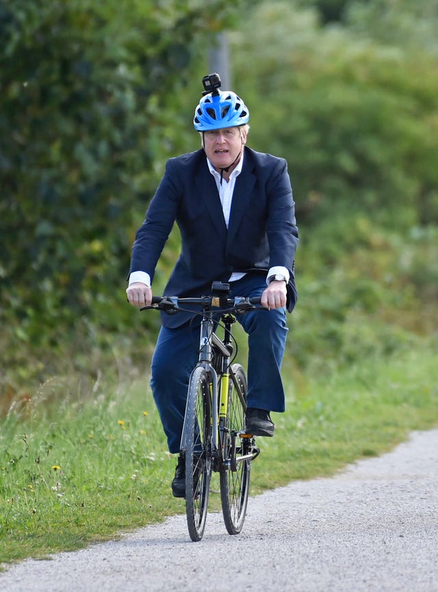 Prime Minister Boris Johnson launched a strategy to get more people cycling (Rui Vieira/PA)