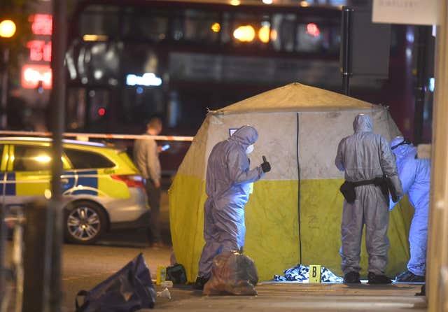 Forensic officers at the scene on Upper Street in Islington (Victoria Jones/PA)