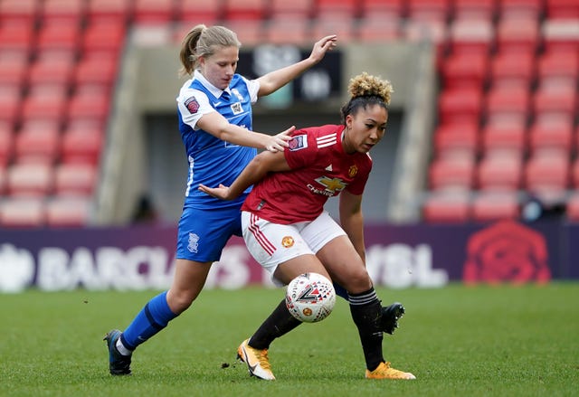 Birmingham's Gemma Lawley (left) and Manchester United's Lauren James battle for the ball during United's 2-0 FA Women's Super League victory on Sunday