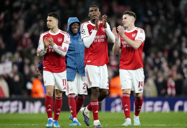 Arsenal players celebrate after seeing off Sporting Lisbon