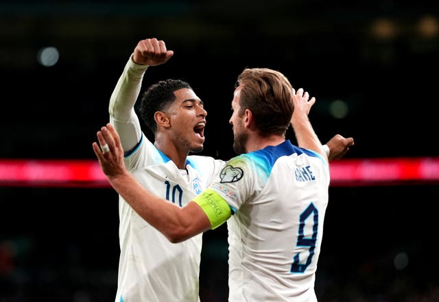Jude Bellingham and Harry Kane celebrate together while playing for England