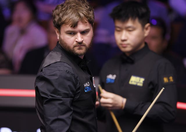Liam Highfield (left) performed well against the reigning world champion.
