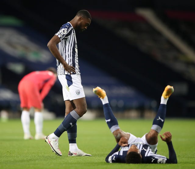 West Brom's Semi Ajayi (left) and Darnell Furlong show their disappointment on the final whistle in their 3-3 draw with Chelsea