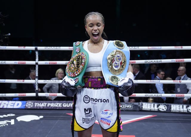 Natasha Jonas with the ICF and WBC world welterweight belts on her shoulders