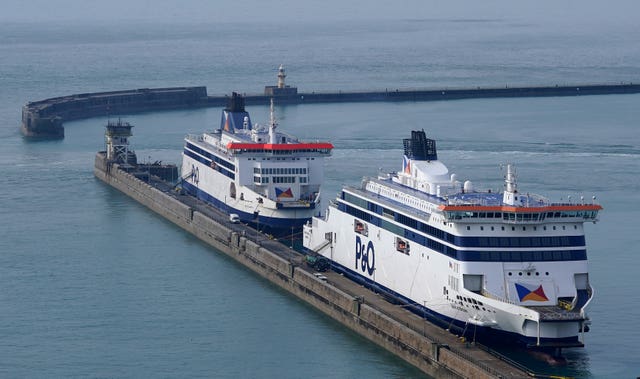 The P&O Ferries vessel Spirit of Britain (right) moored at the Port of Dover in Kent