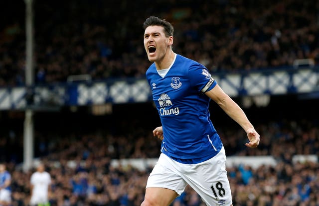 Everton's Gareth Barry celebrates scoring his side's first goal during the Barclays Premier League match at Goodison Park, Everton