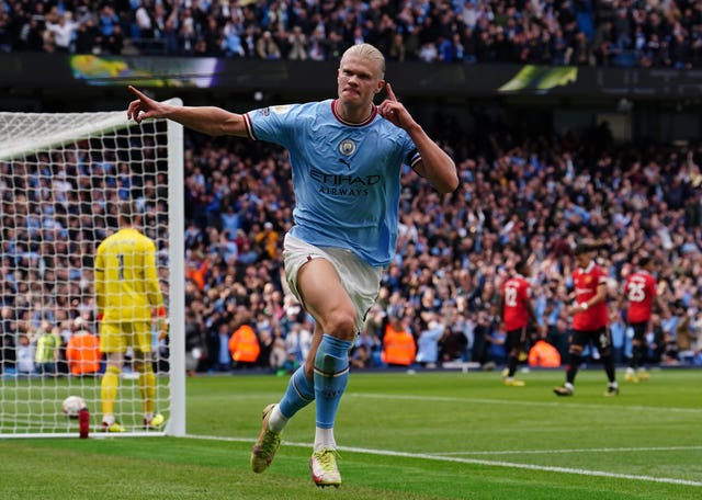 Erling Haaland celebrates scoring against Manchester United