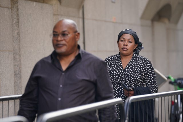 Prosper Kaba and Helen Lumuanganu, outside the Old Bailey in London