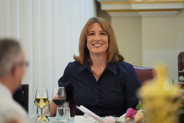 Chancellor Rachel Reeves listens to governor of the Bank of England Andrew Bailey making a speech at the annual Financial and Professional Services Dinner at Mansion House, London