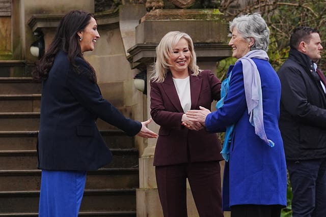 Deputy First Minister Emma Little-Pengelly, left to right, President of Ireland Catherine Connolly and First Minister Michelle O’Neill outside Stormont Castle, Belfast