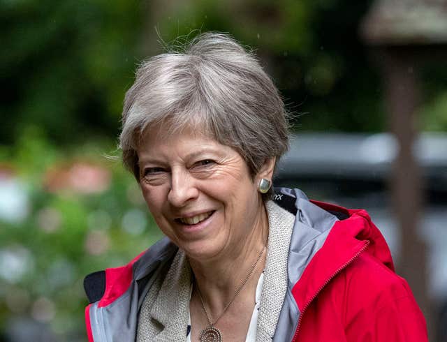 Theresa May attends church