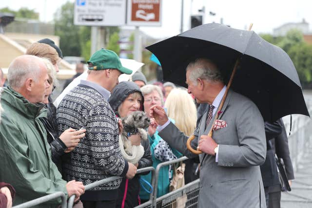 Charles meets the public during a walk about in Omagh town centre (Niall Carson/PA)