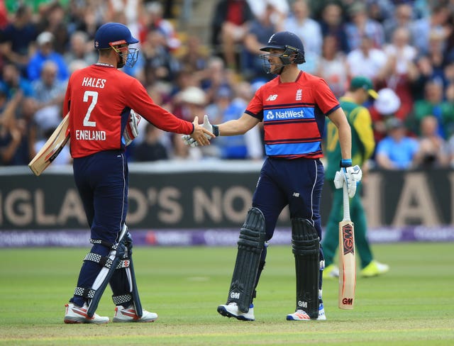 England’s Dawid Malan, right, is congratulated by Alex Hales after reaching his half-century