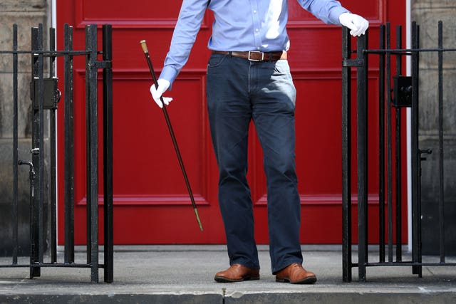 Man holding cane