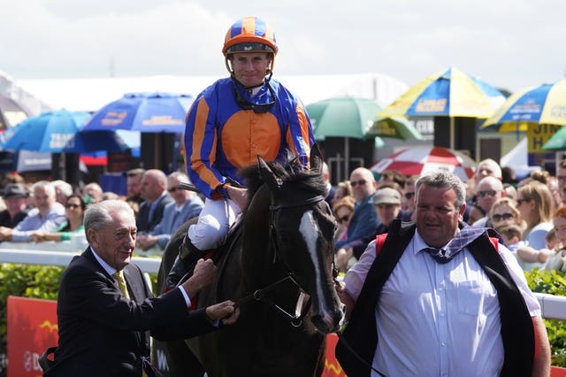 Auguste Rodin and Ryan Moore return