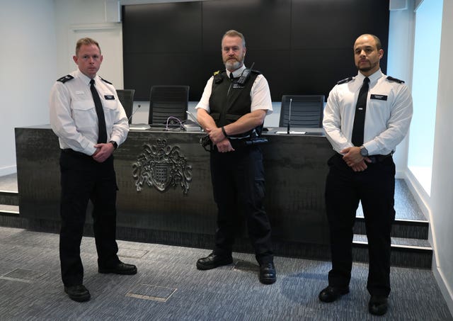 Colleagues of murdered police officer Sergeant Matt Ratana (left to right) Sergeant Gareth Starr, Pc Paul Reading and Sergeant Chris Excell at Scotland Yard 