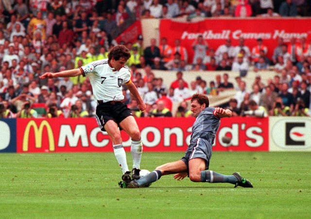 England captain Tony Adams clashes with Germany's Andreas Moller during the Euro '96 semi-final at Wembley (Sean Dempsey/PA)