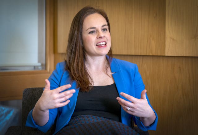 Kate Forbes gesturing with her hands while talking