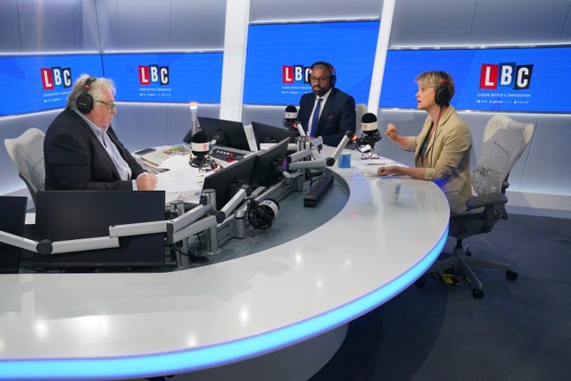 LBC presenter Nick Ferrari, James Cleverly and Yvette Cooper in an LBC studio