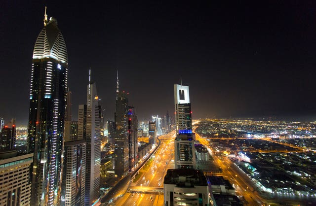A view of the skyline at night of Dubai (Yui Mok/PA)