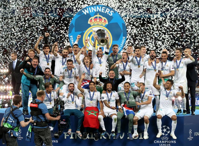 Real Madrid celebrate with the trophy after the 2018 Champions League final