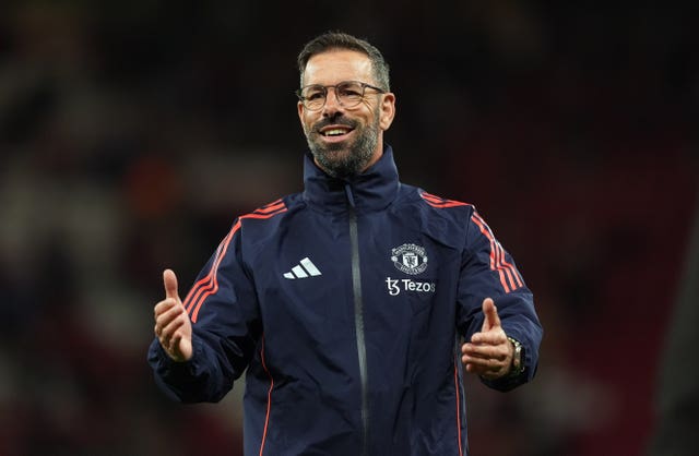 Manchester United coach Ruud van Nistelrooy gives a thumbs-up