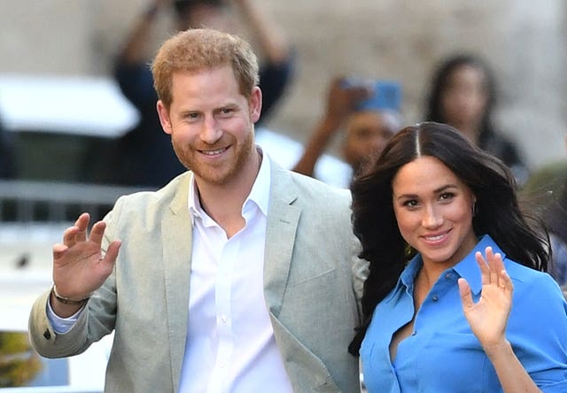 Harry and Meghan are now living in America are stepping down as working royals. Dominic Lipinski/PA Wire