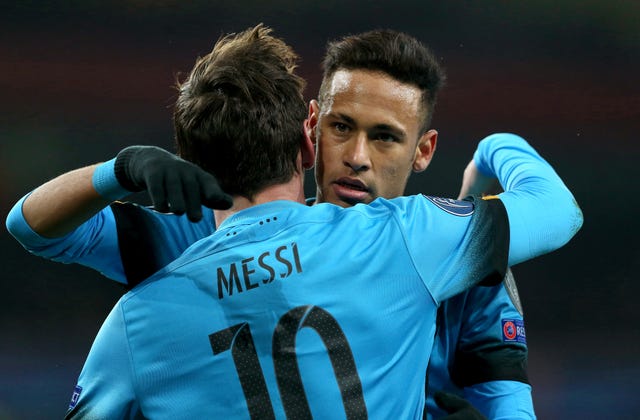 Neymar (right) embraces Lionel Messi