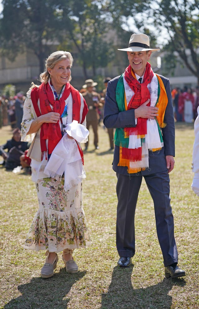 The Duke and Duchess of Edinburgh walk together in Nepal