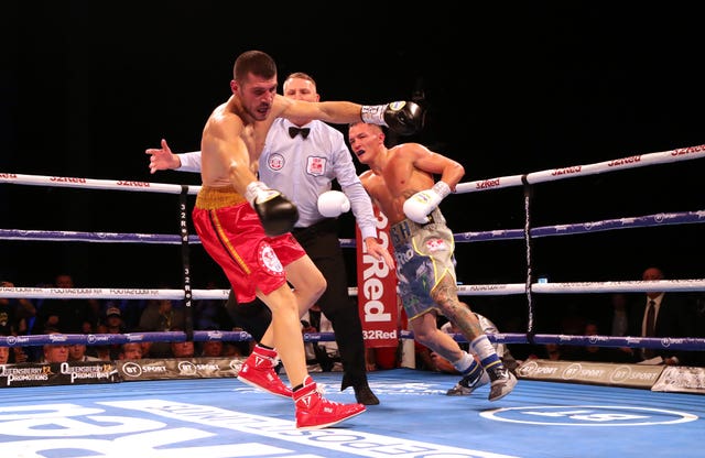 Josh Warrington, right, beats Sofiane Takoucht to retain his IBF world featherweight title 