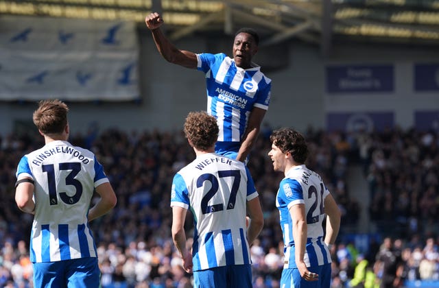 Danny Welbeck celebrates with his Brighton team-mates
